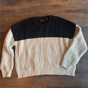 Elegant Black and Cream Crewneck Sweater